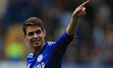 Chelsea's Oscar celebrates scoring against Aston Villa in the Premier League match