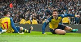 24D1C78100000578-2915617-Giroud_slides_in_jubilant_celebration_and_is_joined_by_Arsenal_t-m-51_1421602651509
